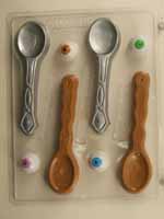 Wooden and metal spoons with eyeballs H129